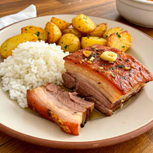 Barriga à bairrada c/ arroz e batatas assadas